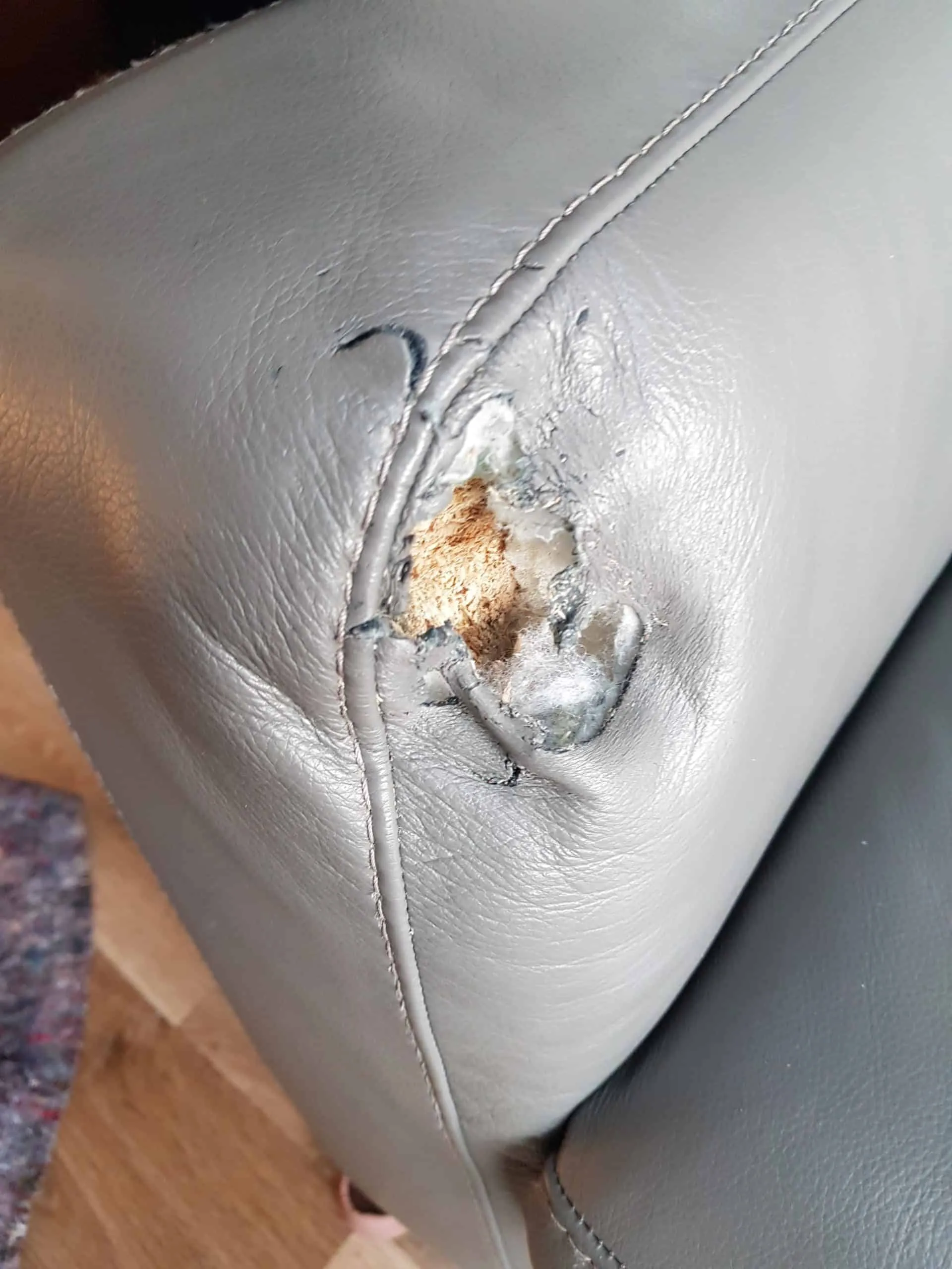 Torn seam repaired, before