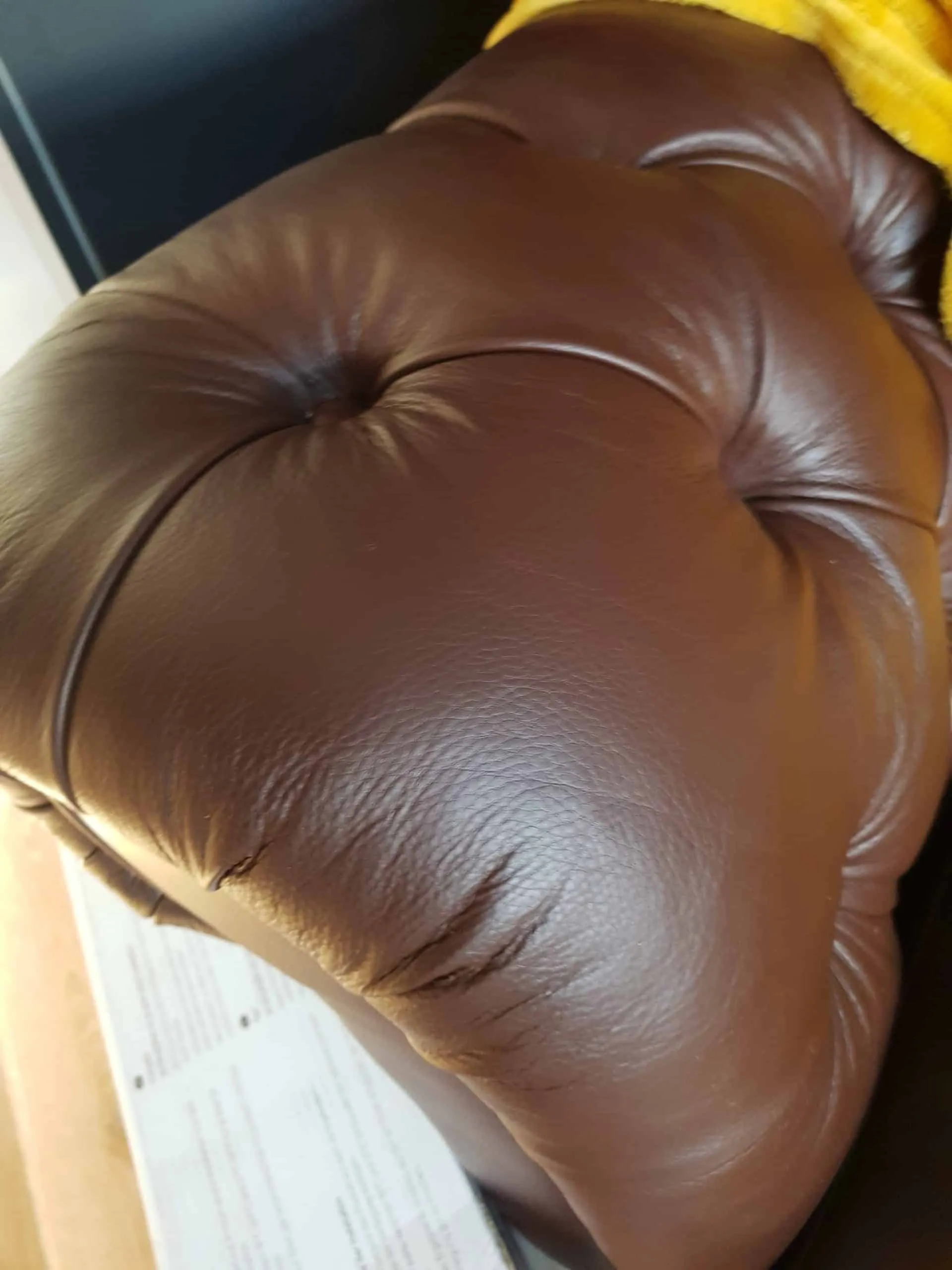 Chesterfield arm: torn leather replaced, after