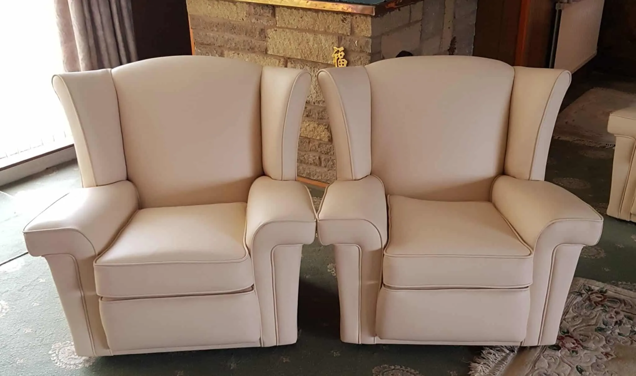 Pair of armchairs re-upholstered, after