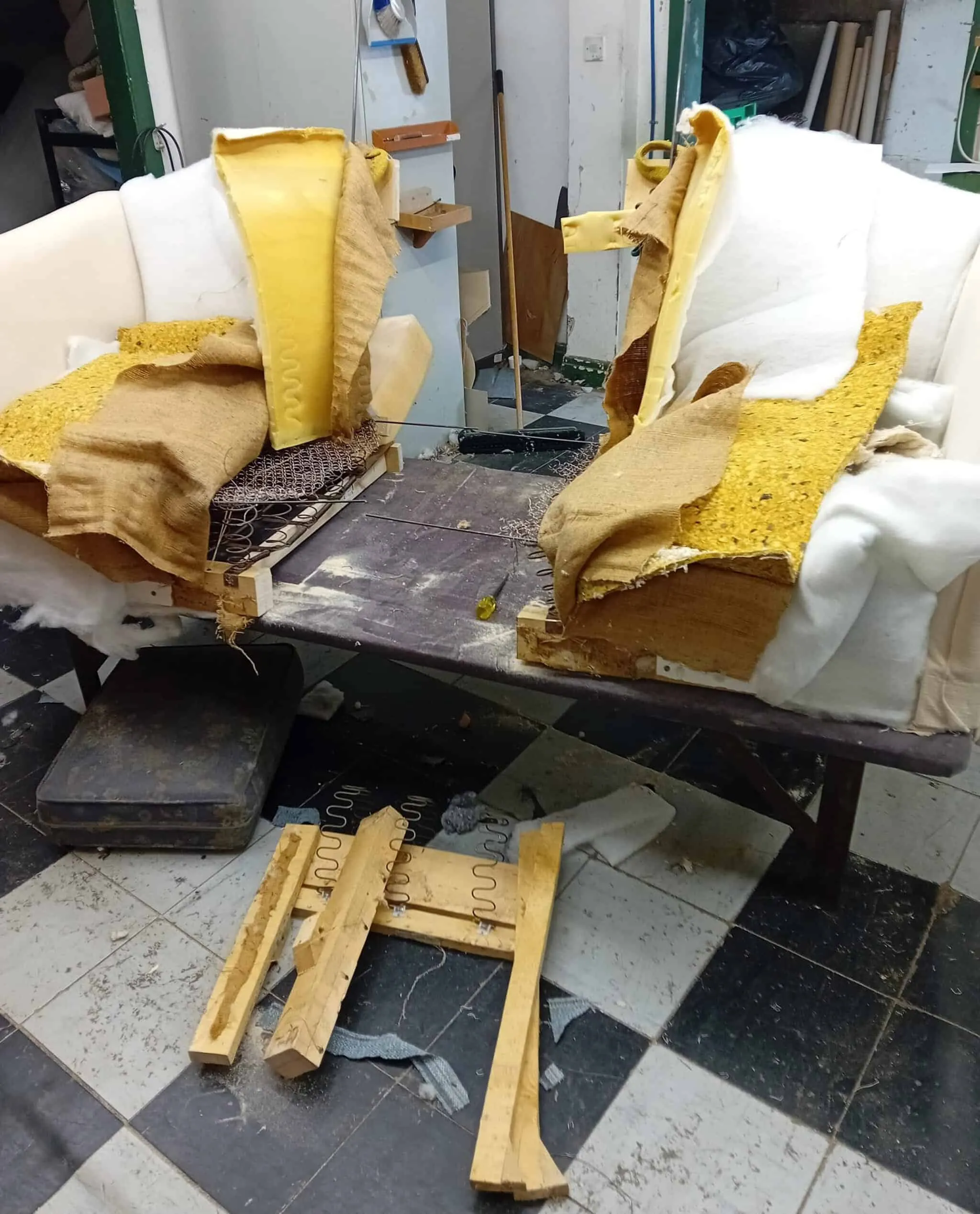 Turning a three-seater into a two-seater, in the workshop